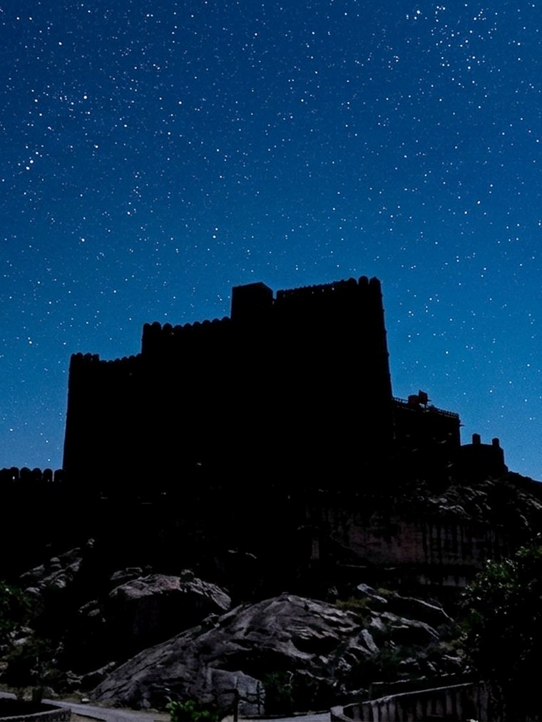 Alila Fort Bishangarh at night, under stars